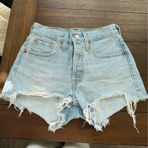 Levi’s light blue denim distressed shorts